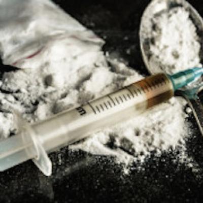 bigstock-Drug-Syringe-And-Cooked-Heroin-76081889-238x179